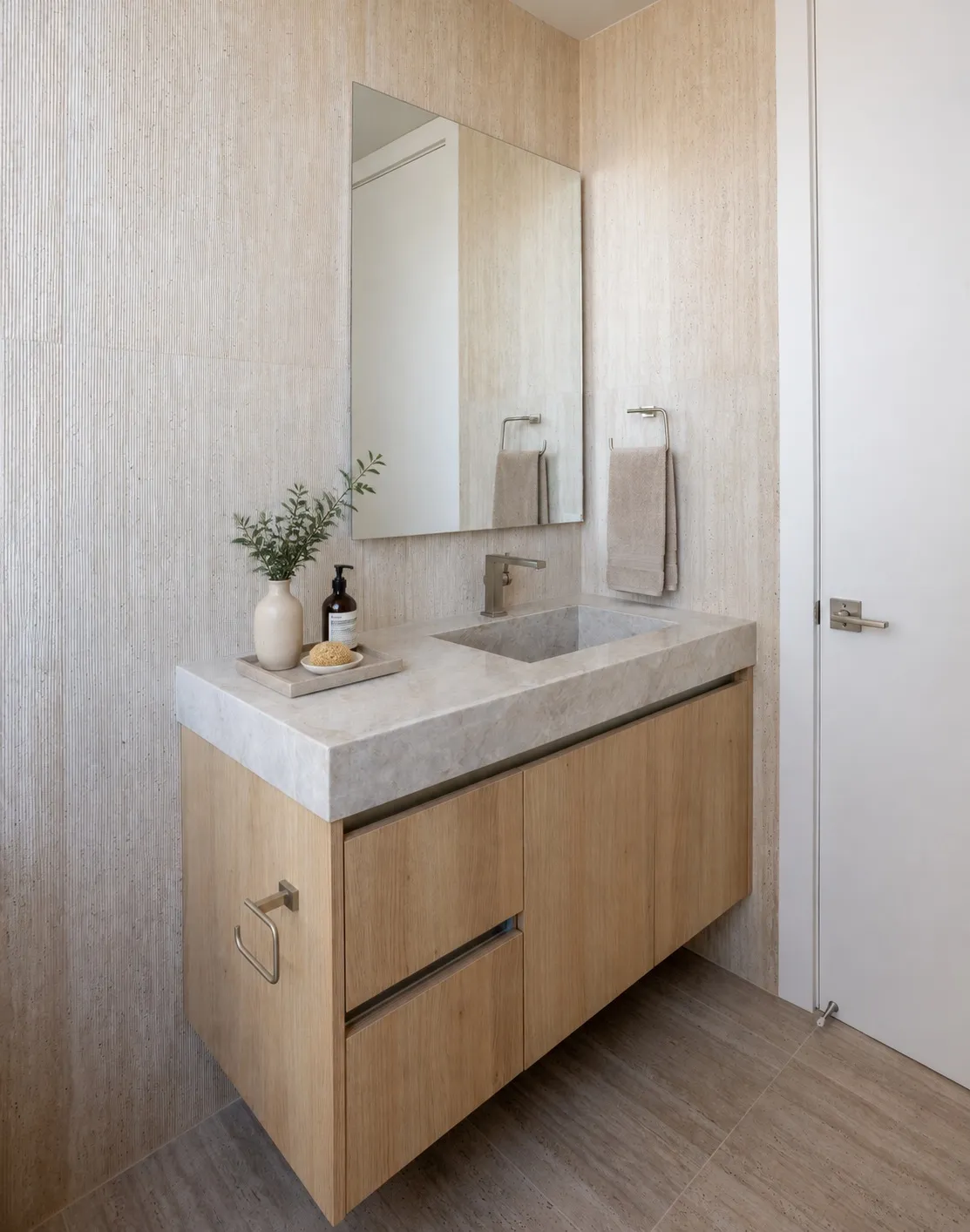 Marquis 3301 guest bathroom by DALOP Design: a floating oak vanity with a stone basin and a full-height mirror
